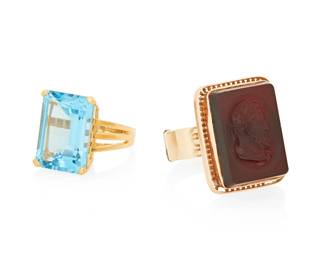1068
Two 14K Gold and Gem-Set Rings
One featuring an emerald-cut blue topaz weighing approximately 16.53 carats, together with a rose gold ring featuring a carnelian cameo ring measuring approximately 21.65 x 15.74 mm
2 pieces
Sizes: 8 and 11
23.1 grams gross
Estimate: $800 - $1,200