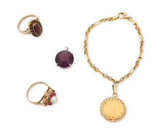 1075
A Group of Gold and Gem-Set Jewelry
Including a 14k gold set 1/10 oz 22K American Gold eagle coin necklace, 2 14k gold rings set with garnets, a cultured pearl and rubies, and a 9k white gold and amethyst pendant
4 pieces
22.6 grams gross
Estimate: $600 - $800