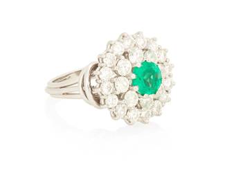 1104
An 18K White Gold, Emerald and Diamond Ring
Centering a round emerald weighing approximately 0.70 carat encircled by two rows of round diamonds weighing approximately 2.80 carats
Size: 6
10.0 grams gross
Estimate: $2,000 - $3,000