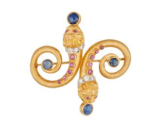 1006
Ilias Lalaounis: An 18K Gold, Sapphire, Ruby and Diamond Brooch
Featuring a lion design set with round rubies, round diamonds and round sapphire cabochons, with partial maker's mark, Greece
Measures: 2 x 2 in.
18.96 grams gross
Estimate: $1,000 - $2,000