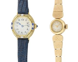 1138
Two 14K Gold Watches
Including one with an ornate case accented by single-cut diamonds and square-cut sapphires finished with a leather band, together with one featuring a small case finished with a satin brushed bracelet
2 pieces
Length: 5 1/2 in. and 6 1/2 in.
37.3 grams gross
Estimate: $600 - $800