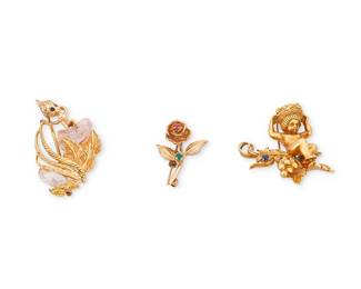 1118
A Group of Gold and Gem-Set Brooches
Including an 18k gold brooch featuring a small child with fruit hat, a 14K gold Ruser sprite on baroque pearl clouds and a 14k gold rose brooch
3 pieces
Measures: 1 3/4 in, 1 7/8 in. and 1 in.
31.6 grams gross
Estimate: $1,000 - $2,000