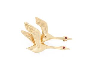 1056
A Gold and Ruby Brooch
Featuring two flying geese finished with round rubies eyes
Measures: 1 1/4 x 3/4 in.
3.5 grams gross
Estimate: $300 - $500