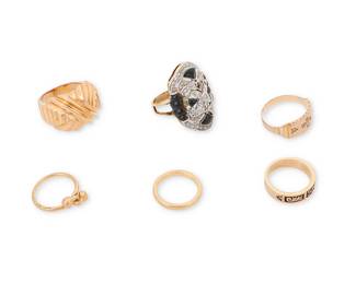 1102
A Group of Gold and Gem-Set Rings
Comprised of six 14k and 18k gold rings, accented by black enamel, onyx and round diamonds
6 pieces
Sizes: 1 3/4- 4 3/4
21.0 grams gross
Estimate: $800 - $1,200