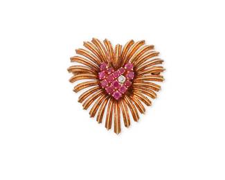 1003
Tiffany & Co.: A 14K Gold and Ruby Brooch
Of a foliate heart design featuring round rubies and a single diamond, signed Tiffany & Co.
Measures: 1 3/8 in.
8.75 grams gross
Estimate: $600 - $800