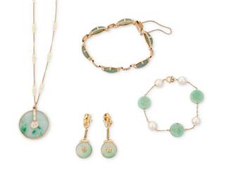 1107
A Group of 14K Gold and Jade Jewelry
Including 2 bracelets a long necklace and a pair of earrings featuring jade and cultured pearls
5 pieces
Bracelets: 7 and 7 1/4 in., Necklace: 30 in., Earrings: 1 3/4 in.
43.3 grams gross
Estimate: $1,000 - $2,000