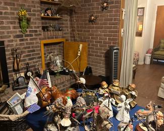 Many beautiful Hummel figurines!! 