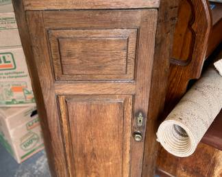 Antique corner cabinet with faux grain painting