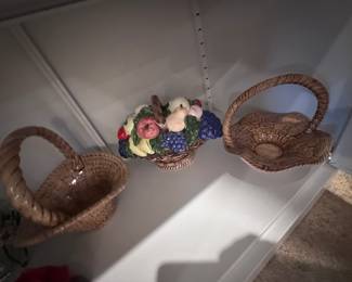 White glass cabinet in LR full of capodimonte and beautiful things