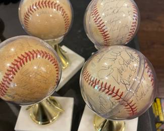 Team signed Baseballs from 1980's Texas Rangers Pete O'Brien, Nick Capra, Bobby Jones, and Odell Jones, Wayne Tewilliger, Allan Lachowicz, Mike Smithson, Charlie Hough, Danny Darwin to name a few