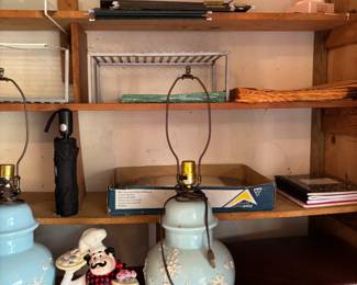 Samsonite suitcase and blue and white floral lamps 