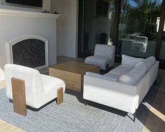 This set is an indoor set that we had outdoors
In order to photograph it. It was used in the home staging. sofa $1800 chairs $400 each Burl
Coffee table $600 rug $300
Hi! The couch is 6ft 8inches and the rug is
13x10