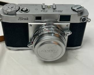 Vintage Ricoh 35mm Camera with Leather Case and Flash Unit