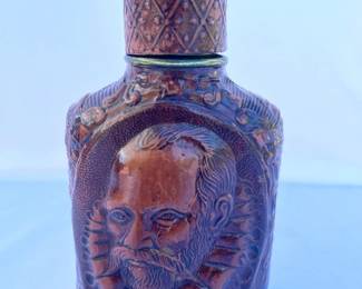 93 LeatherWrappedBottleDecoratedwithFaceofDonQuijote
