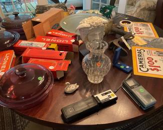 1960s Lionel Trains, Sony Watchman Mini TV, Amethyst Pyrex, Waterford, Kodak Advertisements, CAst Iron Folk Art Cobbler’s Boot Form
