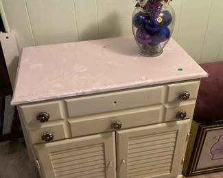 Commode and Vase with Decorative Spheres