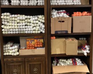 2 CABINETS OF PRACTICE GOLF BALLS
