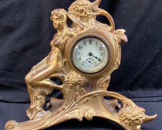 ART NOUVEAU RECLINING WOMAN GILT CLOCK