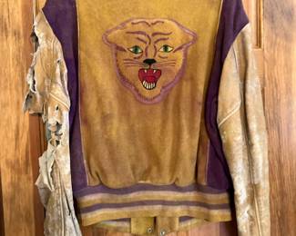 Lion patch on back of letter jacket