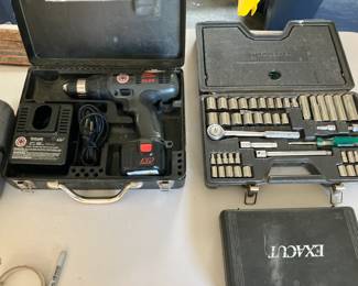 Battery powered drill, socket set