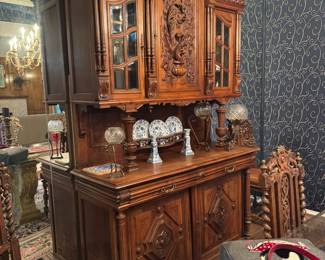 Simply gorgeous German Hunter's Cabinet. Exquisite carvings on the front. Beautiful condition.
