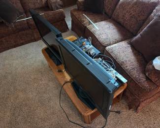 Three TVs And 2 DVD Players