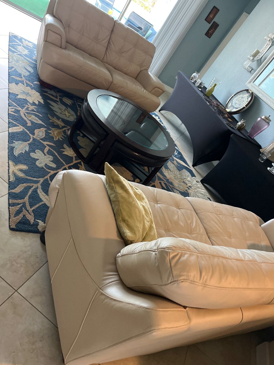 Two faux leather couches