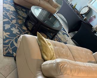 Two faux leather couches