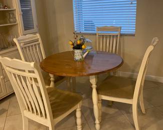 Small kitchen table with 4 chairs. Sides fold down