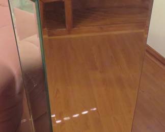 One of two mirrored glass side tables/stands