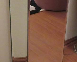 One of two mirrored glass side tables/stands
