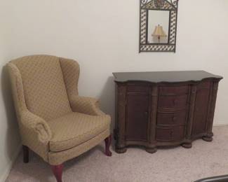 Granite top buffet or chest as shown. Wing chair by Best Chairs, Inc.