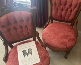 Two Eastlake/Victorian Side Chairs with brass casters on the legs, circa 1880. 