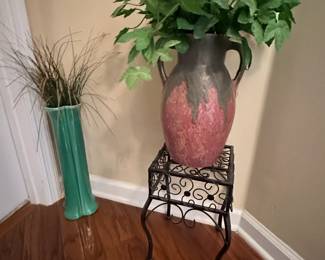 Artificial plants, vases, and plant stand.