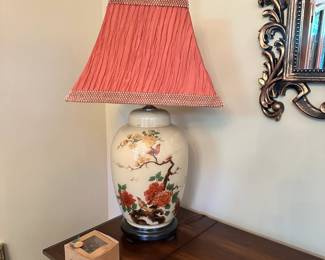 Ginger jar-style lamp with hand-painted floral and bird motifs. 
