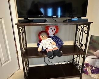 TV, TV stand, vintage Raggedy Ann dolls