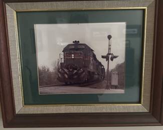 Framed photograph of a Union Pacific freight train, identifiable by the number "8067" visible on the front of the locomotive