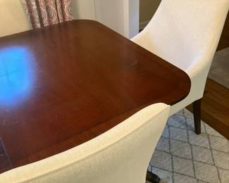 Polished mahogany dining table