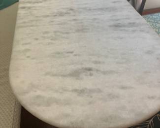Marble table with black stand, and two chair chairs