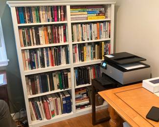 White bookcases, we have two of them and a whole lot of books