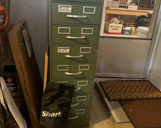 Cool metal cabinet, vacuums
