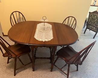 Nice drop leaf table with 4 chairs