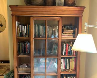 Sliding door bookcase, books, Longaberger baskets