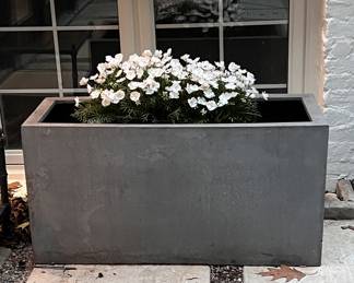Outdoor high quality light weight planters (2 available). 36"L x 16"D x 20"H. Purchased 2 years ago $550 each. $250 each during estate sale.