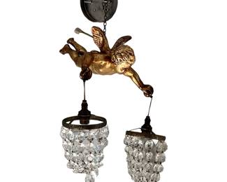 Vintage cherub sconce light with gilt gesso and crystal from a historic Wash, DC property.