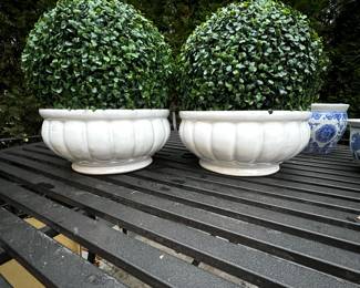 Planters and faux boxwood topiary balls