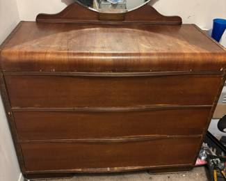 Waterfall dresser w round mirror
44”w 20”d 34”t 66.5”t w mirror $ 150.00