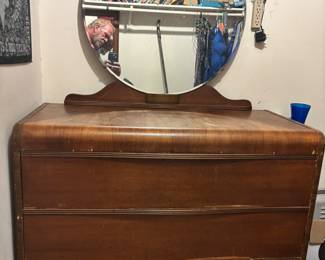 Waterfall dresser w round mirror
44”w 20”d 34”t 66.5”t w mirror $ 150.00