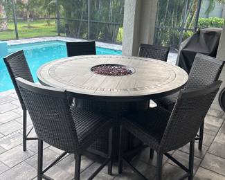 Agio high top fire table with 6 matching chairs 37” x 60” chairs 25” x 19” x 20”-$750
