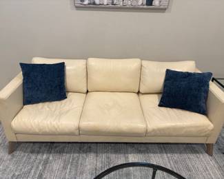cream colored leather sofa 16” x 80” x 34” -$450